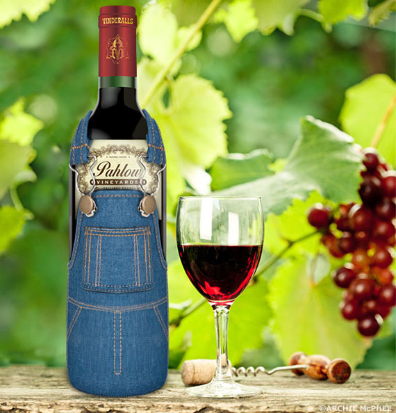 Red wine bottle, glass and bunch of grapes